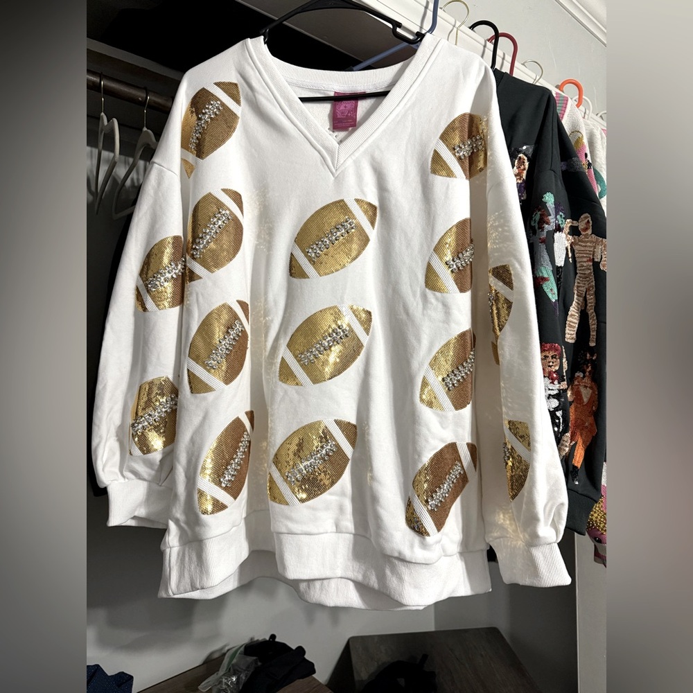 Queen of sparkles football sweater